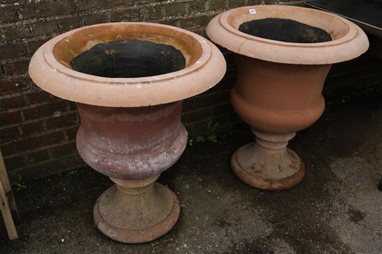Pair reconstituted stone garden urns